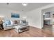 Cozy living room featuring hardwood floors, modern furniture, and an inviting atmosphere for relaxation at 108 Williamsburg Ct, Goose Creek, SC 29445