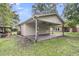 Covered patio with ceiling fans and open to the backyard at 108 Williamsburg Ct, Goose Creek, SC 29445