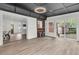 Modern sunroom featuring a stylish bar, and an open-concept design at 108 Williamsburg Ct, Goose Creek, SC 29445