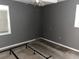 Bedroom featuring gray painted walls, a window and damaged carpeting at 1110 Pickett St, Moncks Corner, SC 29461