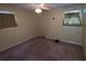 Bedroom with light green walls, carpet flooring, a ceiling fan, and window with light brown curtains at 1110 Pickett St, Moncks Corner, SC 29461