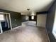 Spacious primary bedroom with carpeted floor, ample natural light from multiple windows, and a walk-in closet at 1110 Pickett St, Moncks Corner, SC 29461