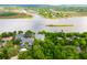 Aerial view of luxurious waterfront community with lush green trees and a private pool at 112 Waterfront Plantation Dr, Charleston, SC 29412