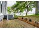Brick patio and waterfront view for scenic outdoor space, and lovely backyard ambiance at 112 Waterfront Plantation Dr, Charleston, SC 29412