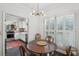 Charming breakfast nook featuring a shuttered window that provides natural light at 112 Waterfront Plantation Dr, Charleston, SC 29412