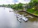 Beautiful waterfront with long private dock, gazebo, and boats parked at 112 Waterfront Plantation Dr, Charleston, SC 29412