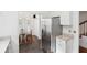 Modern kitchen with stainless steel refrigerator and black tile floor at 112 Waterfront Plantation Dr, Charleston, SC 29412