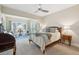 Cozy main bedroom with a bay window sitting area with scenic views and plush carpeting at 112 Waterfront Plantation Dr, Charleston, SC 29412