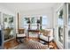 Cozy sitting area with views of the lake and zebra rug at 112 Waterfront Plantation Dr, Charleston, SC 29412