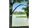 Scenic water view featuring a glimpse of the house, trees, and a serene body of water at 112 Waterfront Plantation Dr, Charleston, SC 29412