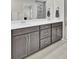 Modern bathroom features double vanity, large mirror, and glass enclosed shower offering a spa experience at 113 Alpine Rd, Summerville, SC 29485