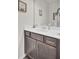 Modern bathroom vanity with quartz countertop and decorative mirror at 113 Alpine Rd, Summerville, SC 29485