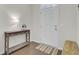 Bright entryway with console table, decorative lamp, and a view of the front door at 113 Alpine Rd, Summerville, SC 29485