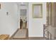 Home entryway featuring hardwood floors, a mirror and view into the living room at 113 Alpine Rd, Summerville, SC 29485