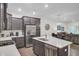 Bright kitchen area with a large center island, stainless steel appliances, and lots of cabinet space at 113 Alpine Rd, Summerville, SC 29485
