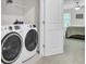 Practical laundry area with new appliances and easy access to the bedroom space at 113 Alpine Rd, Summerville, SC 29485