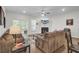 Cozy living room with neutral color scheme and fireplace at 113 Alpine Rd, Summerville, SC 29485