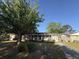 Charming brick home featuring a manicured front yard and a cozy entrance with a blue sky backdrop at 1138 Landsdowne Dr, Charleston, SC 29412