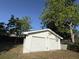 Two car detached garage situated in the backyard, providing ample parking and storage at 1138 Landsdowne Dr, Charleston, SC 29412