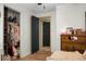 Bedroom includes a closet with clothes and light brown dresser with a bow on it at 1192 Church Of God Rd, Bonneau, SC 29431
