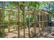 Wooden chicken coop featuring a covered space to protect the animals from the elements at 1192 Church Of God Rd, Bonneau, SC 29431