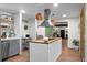 Modern kitchen with stainless steel appliances, stylish countertops, and pendant lighting at 1192 Church Of God Rd, Bonneau, SC 29431