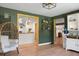 Open-concept living room showcasing seamless flow to the well-appointed kitchen at 1192 Church Of God Rd, Bonneau, SC 29431