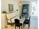 Dining space with unique lighting, a glass table, and seating for four guests at 1202 Ventura Pl, Mount Pleasant, SC 29464