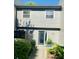 Charming two-story townhome with gray siding, a walkway, and neat landscaping at 1202 Ventura Pl, Mount Pleasant, SC 29464