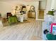 Spacious living room with an open floor plan, neutral colors, and a staircase at 1202 Ventura Pl, Mount Pleasant, SC 29464