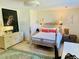 Elegant main bedroom showcasing a decorative four-poster bed and ample natural light at 1202 Ventura Pl, Mount Pleasant, SC 29464