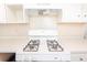 Kitchen featuring white cabinets, and a gas range stove at 1230 Hawthorne Cir, Hanahan, SC 29410