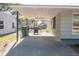 Covered patio featuring a grill and ample space for outdoor entertaining and relaxing at 1230 Hawthorne Cir, Hanahan, SC 29410