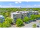 Aerial shot showcasing the well-maintained apartment complex nestled among lush greenery and trees at 125 Pier View St # 405, Daniel Island, SC 29492