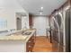 Modern kitchen with stainless steel appliances and granite countertops at 125 Pier View St # 405, Daniel Island, SC 29492