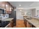 Well-equipped kitchen with stainless steel appliances, and granite countertops at 125 Pier View St # 405, Daniel Island, SC 29492