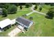 Beautiful single-Gathering home from above, highlighting a large yard, patio deck, and picturesque surrounding neighborhood at 131 Travis Hill Rd, Moncks Corner, SC 29461