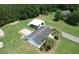 Stunning single-Gathering home, highlighting a detached garage, fenced yard, and verdant surrounding landscape at 131 Travis Hill Rd, Moncks Corner, SC 29461