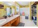 Bathroom with a double sink vanity, shower-tub combination, and ample storage space at 131 Travis Hill Rd, Moncks Corner, SC 29461