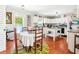 Bright kitchen featuring white cabinetry, modern appliances, and eat-in dining area at 131 Travis Hill Rd, Moncks Corner, SC 29461