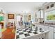 Well-lit kitchen featuring white cabinets, stainless steel appliances, and center island at 131 Travis Hill Rd, Moncks Corner, SC 29461