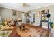 Charming living room with hardwood floors, vintage furniture, and a cozy atmosphere at 131 Travis Hill Rd, Moncks Corner, SC 29461