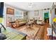 Comfortable living room with large window, area rug, and neutral walls at 131 Travis Hill Rd, Moncks Corner, SC 29461