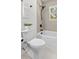 A modern bathroom features a toilet and a shower/tub combo at 1317 White Dr, Charleston, SC 29407