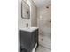 Bathroom featuring a vanity and a shower with bronze fixtures and neutral tile at 1317 White Dr, Charleston, SC 29407