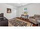 Bedroom featuring hardwood floors, a desk, and a comfortable reading area at 1317 White Dr, Charleston, SC 29407