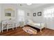 Bedroom featuring a daybed, hardwood floors, and natural light at 1317 White Dr, Charleston, SC 29407