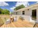 Back porch featuring a table and seating in front of a brick home at 1317 White Dr, Charleston, SC 29407