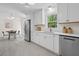 Bright kitchen with stainless appliances and eat-in dining area at 1317 White Dr, Charleston, SC 29407