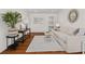 Cozy living room with hardwood floors, comfortable seating, and ample natural light at 1317 White Dr, Charleston, SC 29407